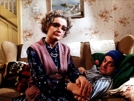 A still from the TV comedy Mrs. Merton and Malcolm, starring Caroline Aherne and Craig Cash as Mrs M and her hapless son.