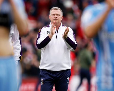 Mark Robins applauds the travelling Coventry fans after the Sky Blues beat Middlesbrough in the Championship playoffs semi-final first leg at the Riverside in May 2023.