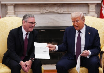 Keir Starmer with Donald Trump holding a letter in the White House