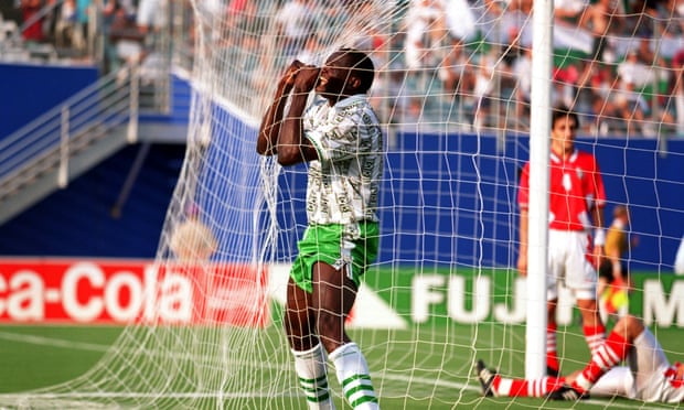 Rashidi Yekini celebrates scoring for Nigeria against Bulgaria.