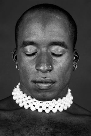 Self-Portrait [with Pearl Necklace], 1993Ajamu is a socially engaged fine art photographic artist producing Black Lesbian, Gay, Bisexual, Trans and Queer imagery in the UK. His work has been included in more than 20 solo exhibitions and 30 group shows in museums, galleries and alternative spaces across Europe, North America, the Caribbean, South Africa and the UK between 1990 and the present. His creative practice is driven by a desire to show Black queer lives as we truly are: with passion, with intimacy, with sex, with desire, with love and with community.