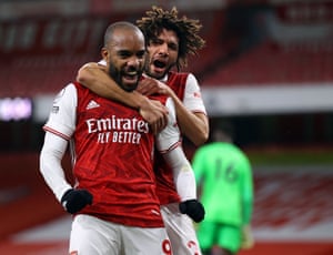 Arsenal’s Alexandre Lacazette (left) is congratulated by Mohamed Elneny after opening the scoring from the penalty spot.