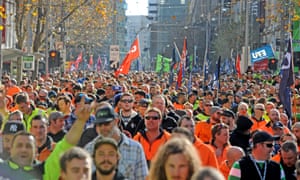 Building and construction workers march during a rally in Melbourne, Tuesday, June 20, 2017. The CFMEU is rallying against the federal government’s reintroduction of the Australian Building and Construction Commission, changes to the Building Code, possible cuts to penalty rates and attacks on workers’ rights. 
