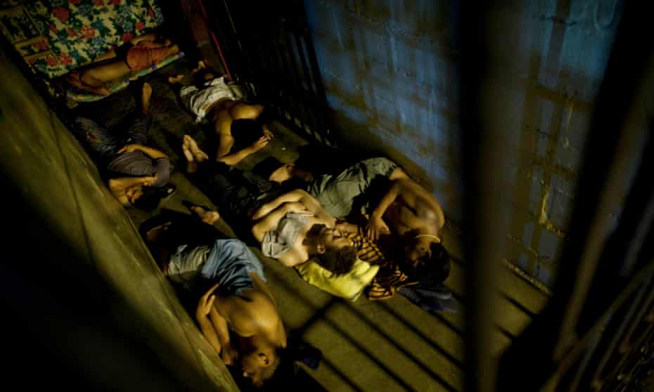 Inmates sleep inside their cell in San Pedro Sula central corrections facility, Honduras