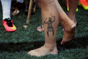 A tattoo on the leg of one of the players acknowledging his Indigenous ancestry.