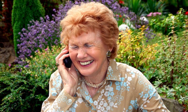Older woman laughing on the phone