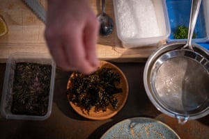 Seaweed condiments are used during the preparation of a dish