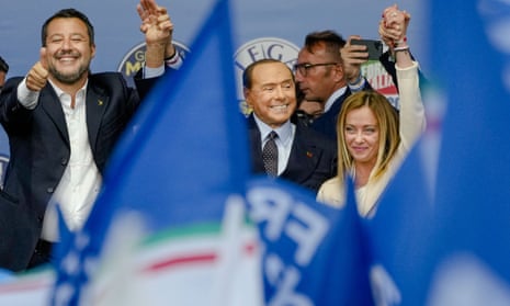 From left, the League's Matteo Salvini, Forza Italia's Silvio Berlusconi and Brothers of Italy's Giorgia Meloni attend the final rally of the far-right coalition in Rome on Thursday.