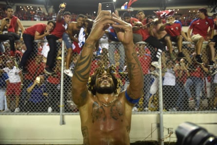 Panama’s Roman Torres takes a picture of his team’s fans celebrating after his winner against Costa Rica sealed a place at the World Cup.