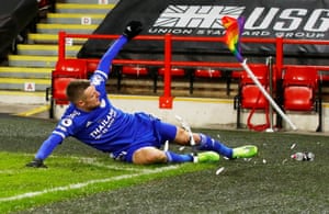 Jamie Vardy kicks the corner flag in celebration after his late winner at Bramall Lane.