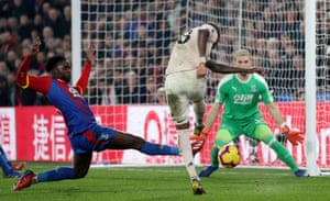 Young scores United's third goal.