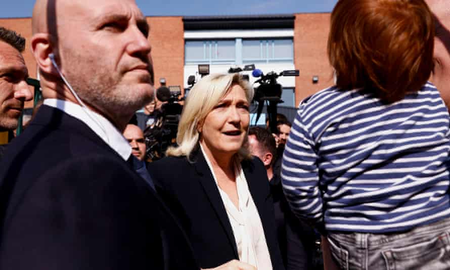 Marine Le Pen arrives to vote at a polling station in Henin-Beaumont