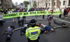 Extinction Rebellion block Whitehall in protest against HMRC and Barclays
