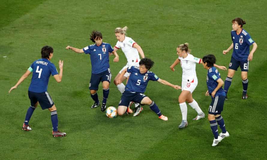 England’s Ellen White in action with Japan’s Nana Ichise and Emi Nakajima.
