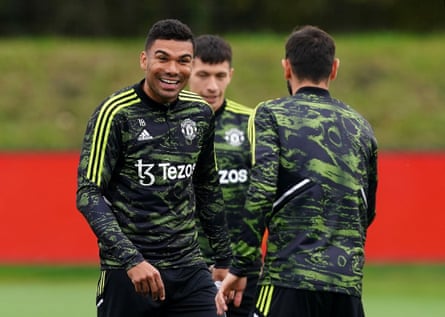 Casemiro shares a joke during Manchester United training