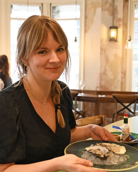 Elle Hunt eats an oyster for the first time