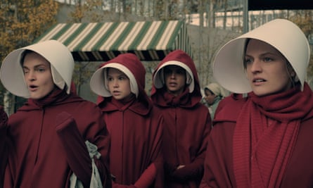 Handmaid chic … Elisabeth Moss, right as Offred in the TV adaptation of Atwood’s 1985 novel.