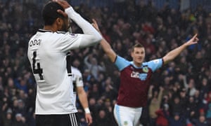 Burnley’s Chris Wood reacts after Fulham defender Denis Odoi put through his own net.