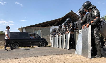 Law enforcement officers in Koi-Tash, where former the president Almazbek Atambayev’s residence is located, on Thursday.