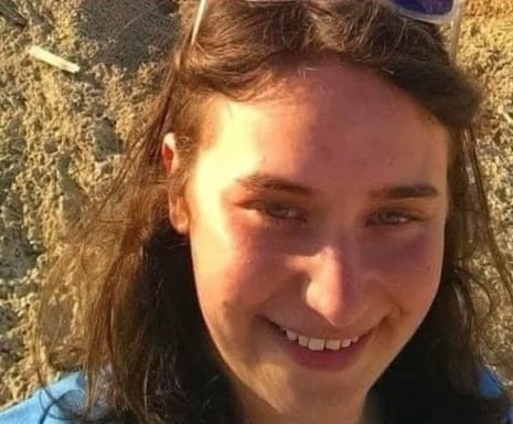 Shayna Feinman smiles widely while taking a close-up selfie outdoors