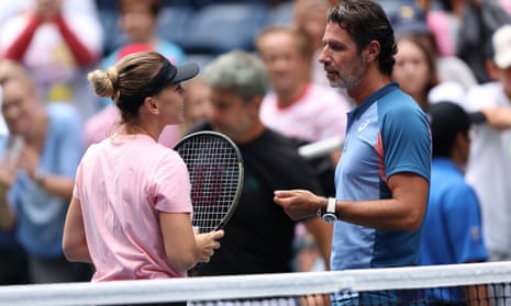 Simona Halep talks to her coach Patrick Mouratoglou during a practice session at this year’s US Open