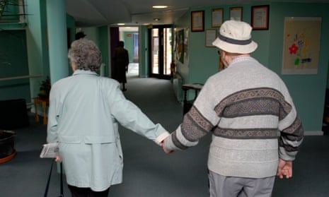 Woman visiting her husband at a care home. The sector is in the midst of a staffing crisis.