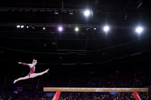 Alice Kinsella of England competes on balance beam during the women’s all-round final.