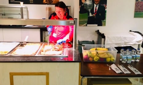 Woman prepares food at the club's stadium