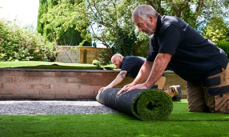 ‘People put fags out on it and it was fine’ … rolling out a fresh plastic lawn.