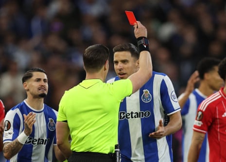 Jan Bednarek is shown a red card by referee Danny Makkelie