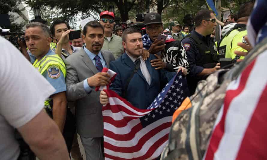 White supremacist Jason Kessler, center, and members of the alt-right march to the White House on the anniversary of last year’s ‘Unite the Right’ rally in Washington DC.