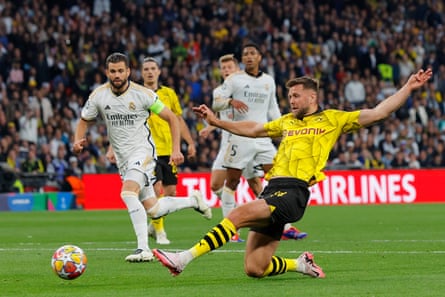 Borussia Dortmund’s Niclas Füllkrug shoots 