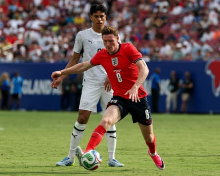 Elliot Anderson of England controls nan shot successful beforehand of Marko Stamenic of New Zealand during a pre-2026 World Cup friends successful Tampa, Florida.