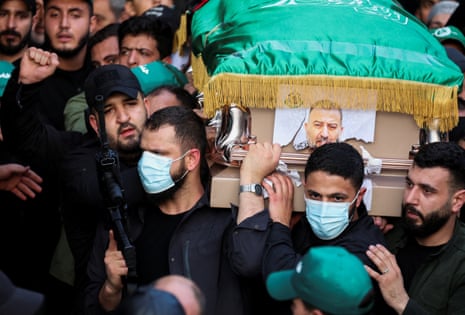 Mourners gather during the funeral of senior Hamas figure Saleh al-Arouri in Beirut.