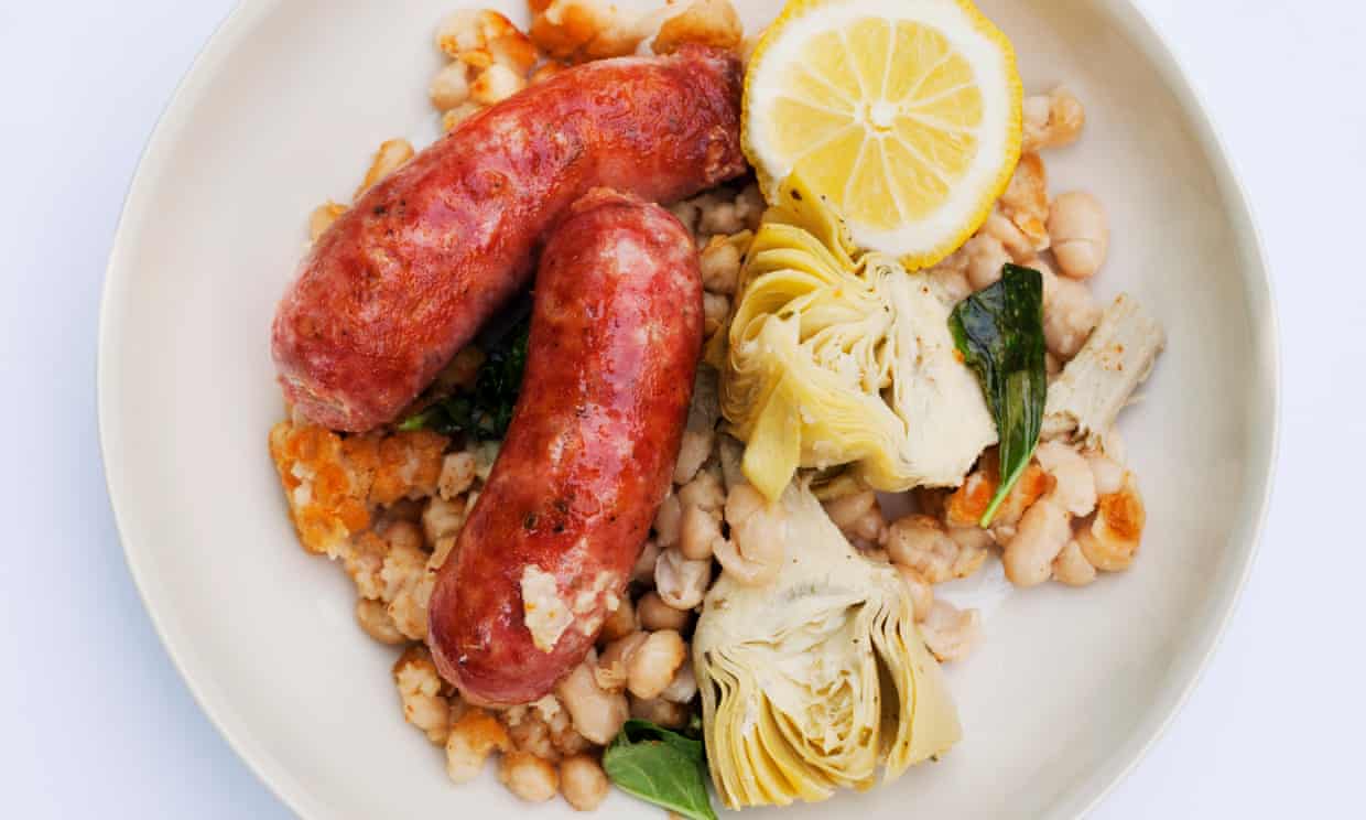 Cannellini with fennel sausage and artichokes on a plate