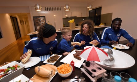David Luiz, seen here enjoying a barbecue with Ethan Ampadu, Tiémoué Bakayoko and a young Australian fan, has responded well to life under Sarri.