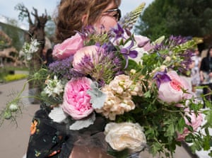 A bouquet of roses and peonies