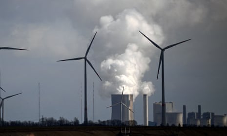 Wind turbines and a coal-fired power station in Germany