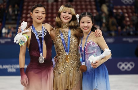 Alysa Liu with her fellow medalists, Kaori Sakamoto and Ami Nakai.