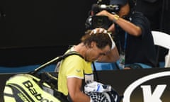 Spain’s Rafael Nadal leaves the court after defeat to Fernando Verdasco.