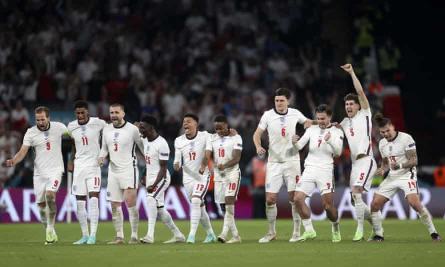 England players celebrate after England’s goalkeeper Jordan Pickford saved a penalty.