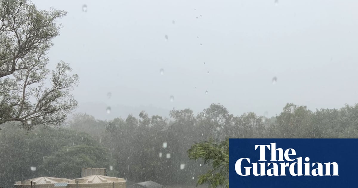 Winds and heavy rain hit Coen in far north Queensland as Cyclone Narelle makes landfall – video
