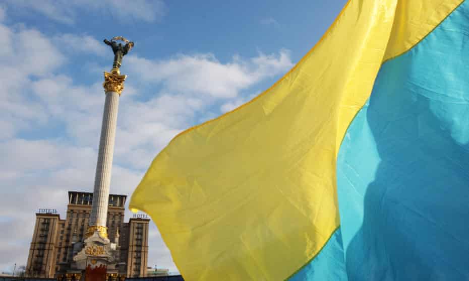 The Independence Monument and flag of Ukraine are seen on the Independence Square in the centre of Kyiv.