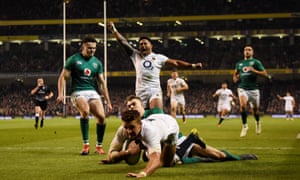 England’s Manu Tuilagi celebrates as Henry Slade scores their third try in the win over Ireland.