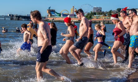 Boxing day dippers charge into the sea to raise funds at the annual RNLI event in Southend.