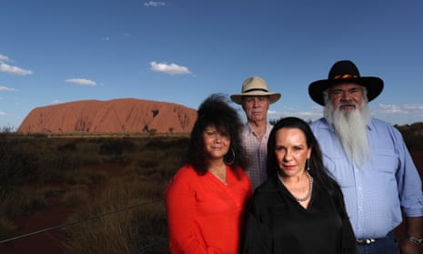 (L-R) Labor parliamentarians Malarndirri McCarthy, Warren Snowdon, Linda Burney and Pat Dodson at Uluru on Sunday evening. They have collectively criticised the prime minister for failing to show up to the Uluru climb closure celebrations.