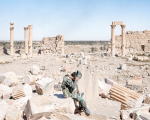 Lorenzo Meloni: Palmyra, Syria, 2016Inside the historic town of Palmyra, retaken from IS by Syrian Arab Army. A Syrian Army soldier removes his helmet, sitting on the rubble of the former Temple of Bel, one of several sites in Ancient Palmyra destroyed by Islamic State militants