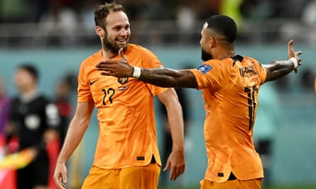 Daley Blind is congratulated by Memphis Depay for doubling the Netherlands' lead.