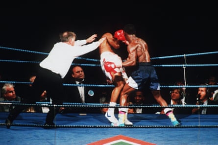 The referee stops the fight as Chris Eubank knocks down Michael Watson in 1991.