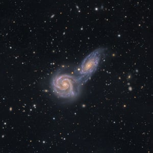 Spiral galaxies in close proximity